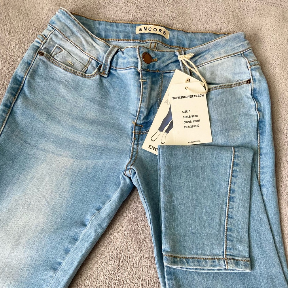 Light bright blue , skinny , new condition,